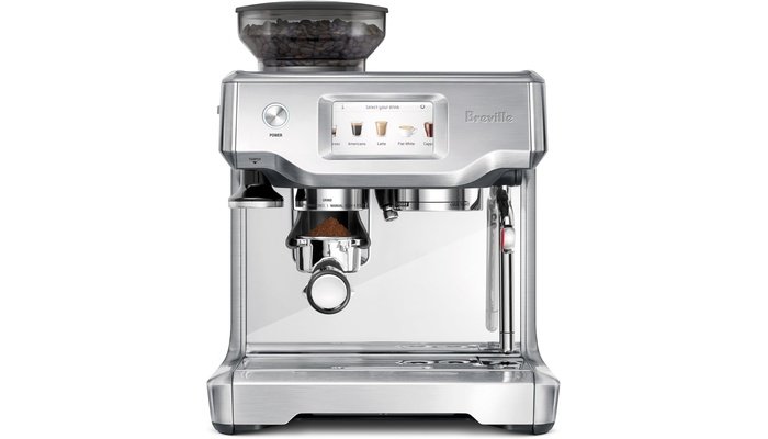 Breville Barista Touch espresso machine with touchscreen and auto milk texturing on kitchen counter