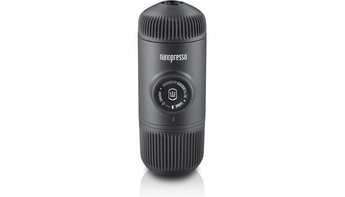 WACACO Nanopresso Portable Espresso Machine 20 bar portable espresso maker being used to brew espresso on a desk