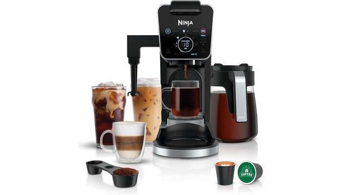 Ninja DualBrew Pro hybrid coffee maker brewing both ground coffee and K-Cup pods on kitchen counter