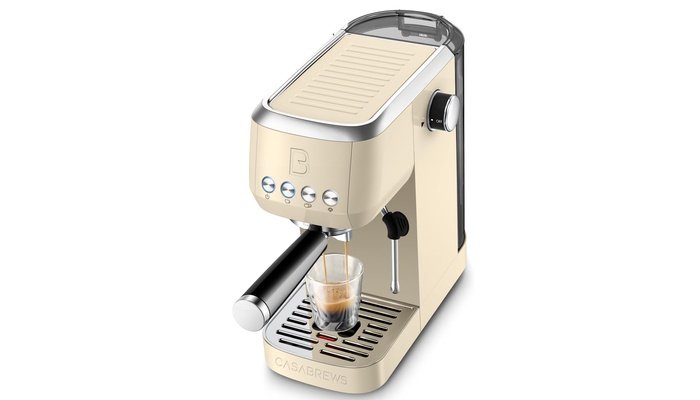 CASABREWS 3700 Essential stainless steel espresso machine on wooden counter with cappuccino